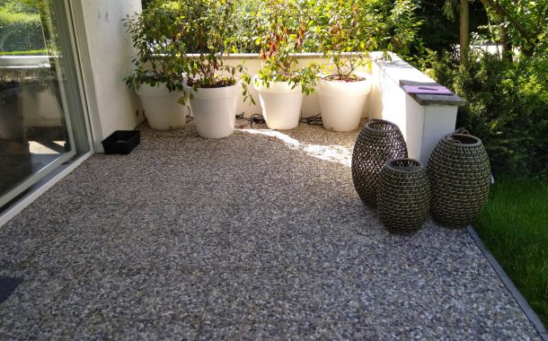 Terrassensanierung mit Moasik-Steinbelag.